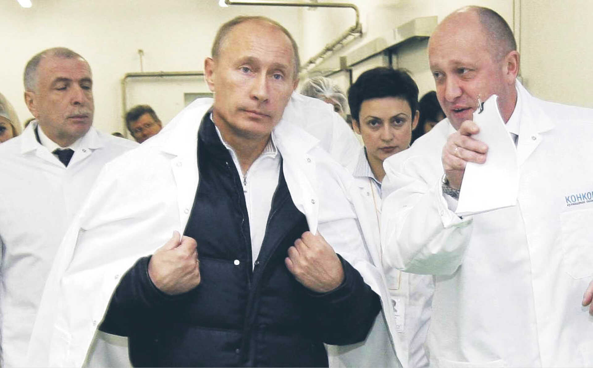 Prokremlowski oligarcha Jewgienij Prigożyn (po prawej) już w ubiegłym roku trafił na listę sankcji UE