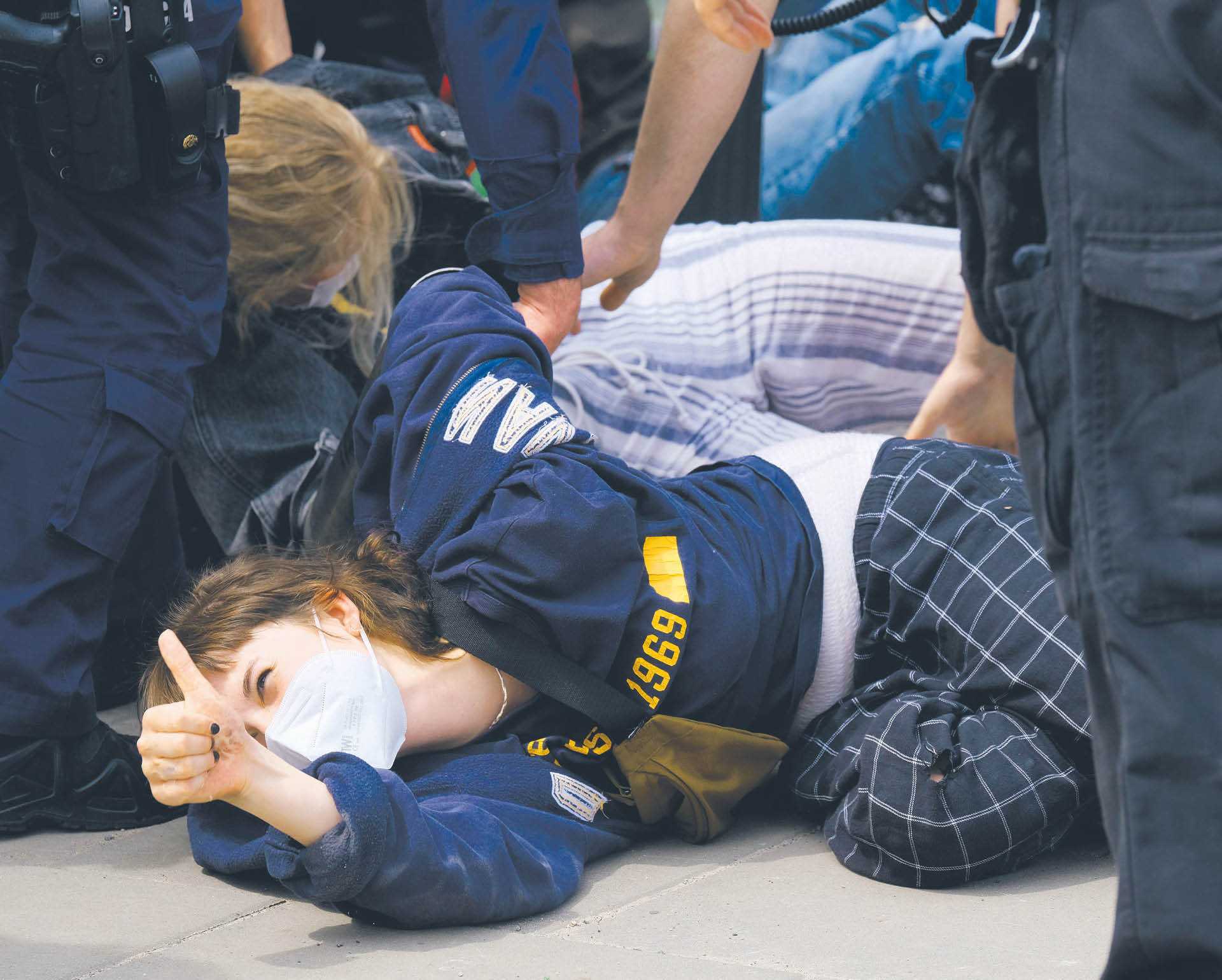 Police remove Extinction Rebellion Poland activists who blocked one of the major streets in Warsaw, the Wisłostrada. Warsaw, 24 May 2021